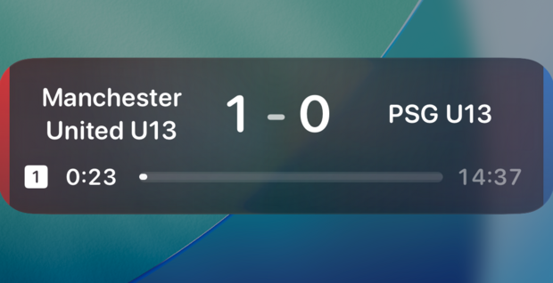 Live Activity showing 1–0 with the first-half clock running